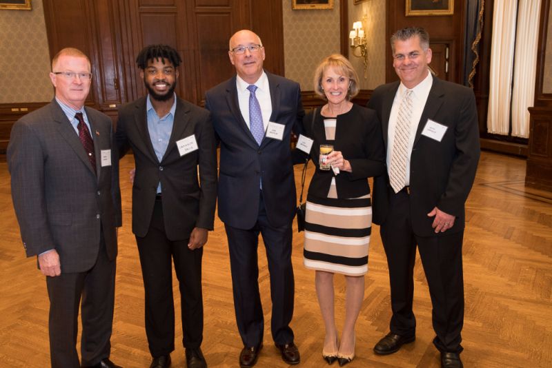 Group of professionals pose together during Annual Members Meeting 2017 event.
